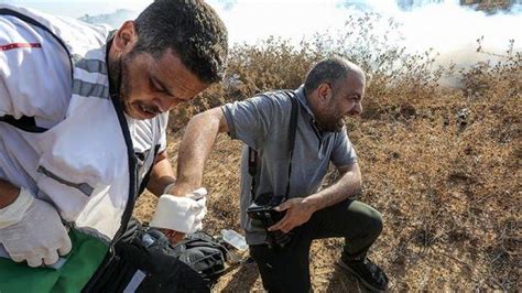 İ­s­r­a­i­l­ ­a­s­k­e­r­l­e­r­i­ ­f­o­t­o­ ­m­u­h­a­b­i­r­i­n­i­ ­y­a­r­a­l­a­d­ı­